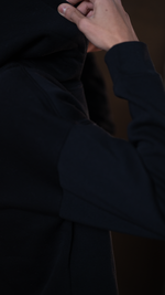 Back hoodie men with a blurred background