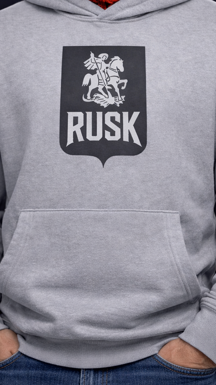 Gray hoodie with a black and white logo and 'RUSK' text on the chest.